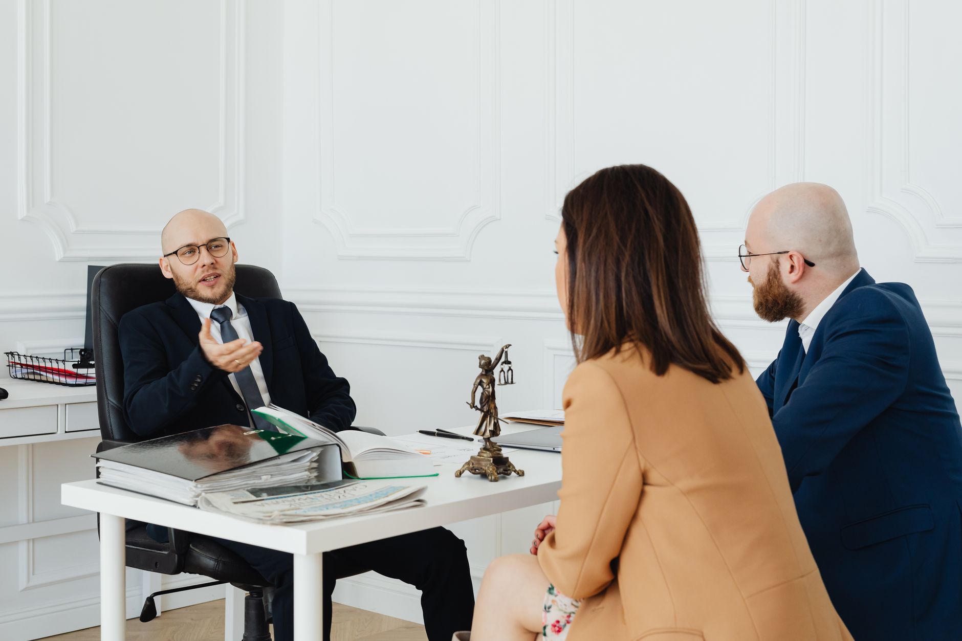 People seated around an office meeting table